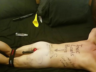 BDSM Humliliated faggot slave covered in degrading body writing